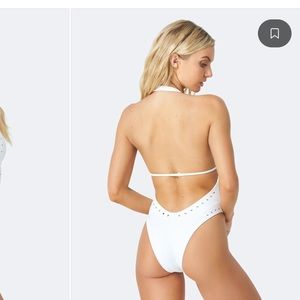 GIGI C swimsuit size Large. Carrie plunging one piece. Never been worn.